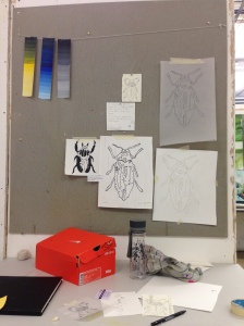 Insperation wall with current illustrations of Beetles.